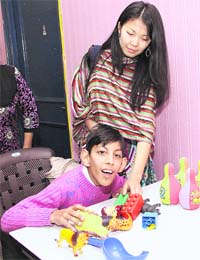 An intern with a student at Smith Institute in Jalandhar