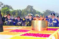 Chief of Naval Staff Admiral Nirmal Verma, Chief of Army Staff Gen VK Singh and Chief of Air Staff Air Chief Marshal NK Browne pay homage to martyrs at the Amar Jawan Jyoti on Navy Day in New Delhi on Sunday