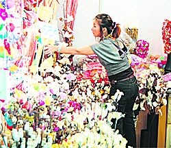 A stall owners sells flowers at PITEX, an international trade expo, organised in Amritsar.