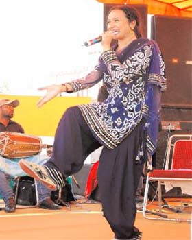 Punjabi singer Satwinder Bitti performs during a rally organised by the Congress, in Bathinda on Monday