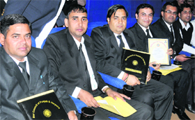 Advocates with their practising licence which they received at a function organised by the Bar Council of Punjab and Haryana in Sector 37, Chandigarh, on Monday.