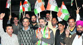 Chander Mukhi Sharma, Congress candidate from Ward 15, on a padyatra with his supporters at Sector 44-C, Chandigarh, on Monday.