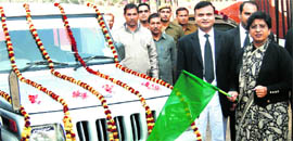 Sneh Prashar, District and Sessions Judge-cum Chairperson of the District Legal Services Authority, flags off a legal awareness van at Rewari.
