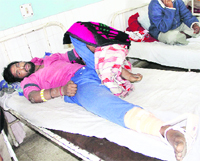One of the undertrials undergoes treatment in the prisoners ward in the Civil Hospital in Jalandhar on Monday. His right leg was allegedly fractured in the thrashing incident. 