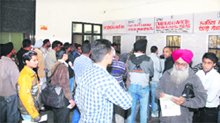 Long queues of applicants at the District Transport Office in Jalandhar on Monday. 