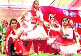 Students of Don Bosco Global School present dance during the foundation stone laying ceremony of a swimming pool at the Global Sports Complex in Ludhiana