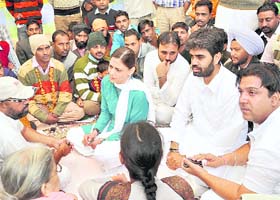 PPP chief Manpreet Badala wife Vinu Badal and Bhagwant Mann meet activists of the EGS Teachers Union in Gidderbaha on Monday