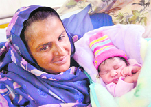  Mukhtar Mai is all smiles as she holds her 