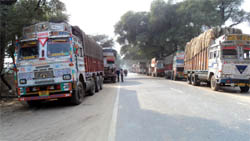 Heavy vehicles were stranded as the inter-state barrier staff observed strike