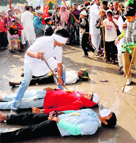 Devotees take part in a Muharram procession at Sector 29 in Chandigarh on Tuesday.
