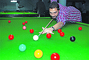 Aneesh Saini aims the target during the final match in Panchkula on Tuesday.