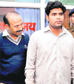 Mausam Sharma, one of the suspects who shot at a woman last month, in police custody on Tuesday.