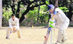 A batsman plays a shot in a match in the Twenty20 Beehive Challengers' Cup Cricket Tournament at Matawala Bagh Ground in Dehradun on Tuesday