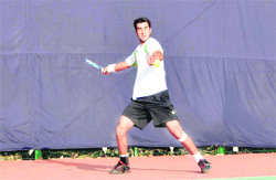 A player in action in the PSSB Tennis Tournament being played in Dehradun on Tuesday. 