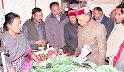Chief Minister Prem Kumar Dhumal meets Kaul Singh Thakur, state Congress chief, at the IGMC in Shimla on Tuesday.