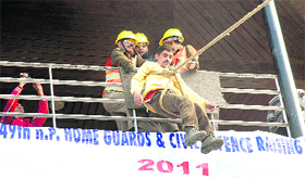 A rescue operation in progress during a mock drill conducted on the occasion of the 49th Raising Day of the Himachal Home Guards and civil defence organisations in Shimla on Tuesday.
