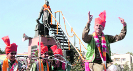 Artistes perform during a function held to pay homage to Dr Bhim Rao Ambedkar in Jammu on Tuesday.