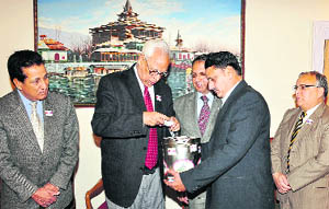 Governor NN Vohra launches a collection drive for the Armed Forces Flag Day Fund by contributing to it at Raj Bhawan in Jammu on Wednesday.