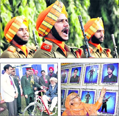 Army jawans during the Armed Forces Flag Day celebrations in Jalandhar on Wednesday; Kamaljit Kaur gazes at a portrait of her son who made the supreme sacrifice for the country; Lt-Gen Sanjeev Madhok gives away a tricycle to an ex-serviceman in Jalandhar on Wednesday