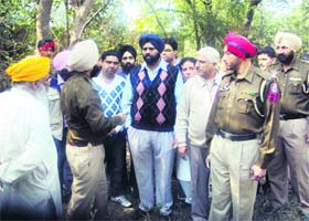 DSP Harpal Singh speaks to shopkeepers at Kukkar Bazar at Jagraon on Wednesday