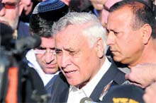 Israeli former President Moshe Katsav being taken to prison from the city of Kiryat Malachi on Wednesday