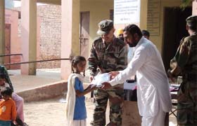 Students receiving educational kits