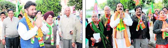 Pardeep Chhabra, Congress candidate from ward number 3; and (right) his BJP rival Arun Goyal canvass at Sector 22 in Chandigarh on Thursday