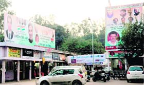 Congress and BJP hoardings put up at Sector 20 in Chandigarh
