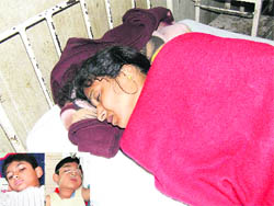 Alka and her two sons (inset) under treatment at the PGIMS, Rohtak, on Thursday morning