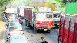 Long queue of vehicles on the Jalandhar-Nakodar highway due to the ongoing protest by farmers and labourers on Thursday