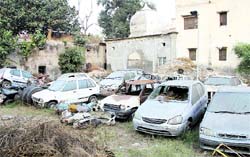 Unclaimed and condemned vehicles dumped at the Division No. 4 police station in Jalandhar