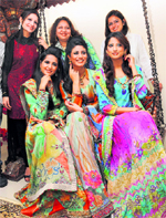 Models don exquisite dresses at the Glitz & Glamour Fashion Exhibition
