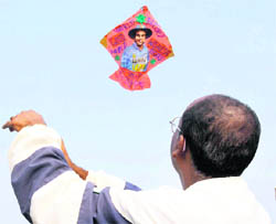 Love of a fan pours out as he puts the picture of cricketer Virender Sehwag on a kite to celebrate his highest score in ODI