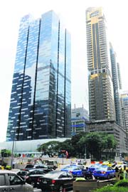 The central business district in Singapore. As European leaders battle to save the euro, some Asian companies are already scouting for new markets around the globe in the face of declining orders from the troubled eurozone. 