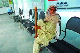 Surjit Kaur, an elderly patient who came all the way from Gursaran village in Bathinda district, vainly waits for a doctor at the OPD of the Civil Hospital in Bathinda on Friday