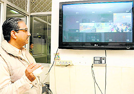 Injured constable Gulab Singh views the CCTV footage at the Government Multi-Speciality Hospital, Sector 16, for clues in Chandigarh on Friday. Tribune photo Manoj Mahajan