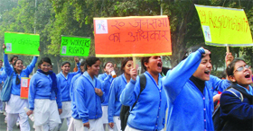 Schoolgirls take part in the International Walk for Human Rights from India Gate to Rajghat in New Delhi on Friday.
