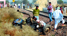 The mangled remains of the tractor, which was hit by the Lalgarh-Bathinda passenger train near the Jassi Bagh Wali village in Bathinda on Saturday.