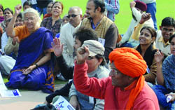 Social activist Medha Patekar with Swami Agnivesh sit on a dharna at Rajghat in support of human rights activist Irom Sharmila to mark Human Rights Day  in New Delhi