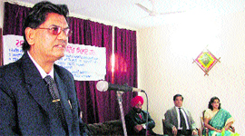 District Sessions Judge SP Banga addresses students on the Human Rights Day in Ludhiana on Saturday.