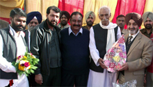 Former DGP Paramdeep Singh Gill (extreme right) being greeted by the private bus operators union at Moga on Sunday. 