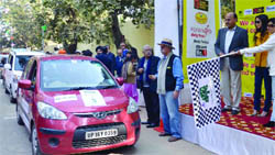 The car rally being flagged off. 