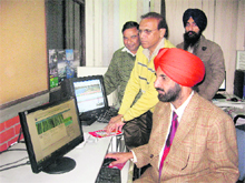 Punjab Pollution Control Board chairman KS Pannu launches the online services in Patiala on Sunday.