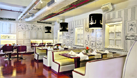 The caricatured walls at Smoke House Deli 