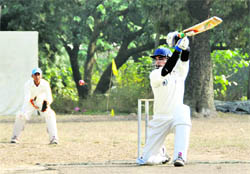 A batsman misses the shot in a match in the Twenty20 Beehive Challengers Cup Cricket Tournament at the Matawala Bagh ground in Dehradun on Monday. 