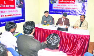 Officials from NABARD and the MSME inform the youth from the rural areas about technical assistance provided by the government to them in Haridwar on Monday. 
