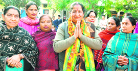 Rajinder Kaur Rattu, BJP candidate from ward No. 24, during her campaign at Vikas Nagar, Chandigarh, on Tuesday.