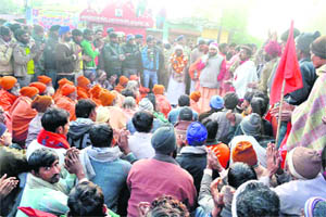 Religious leaders and quarrying supporters move towards the Matra Sadan ashram at Jagjeetpur as part of their protest in Haridwar on Tuesday.