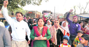 Anupama Rawat, state Congress general secretary, takes out a padyatra at Jwalapur in Haridwar on Tuesday. 