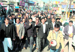 Members of the Jammu Bar Association take out a rally in Jammu on Tuesday